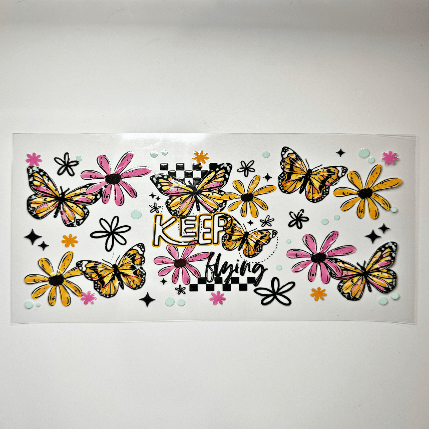 Creative Butterfly Keep Flying motivational wall art featuring a colorful butterfly design on a white background.