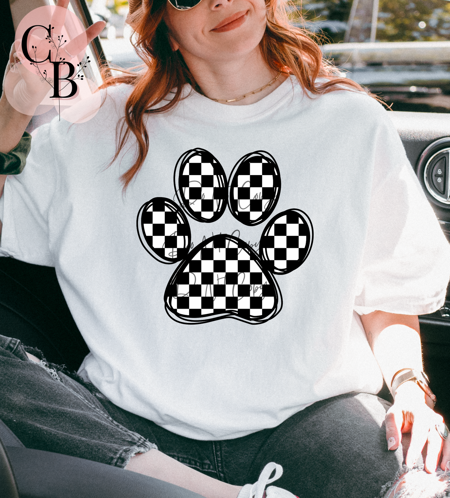 Checkered paw print plush toy from Creative Butterfly, featuring a black and white checkered pattern on soft fabric.