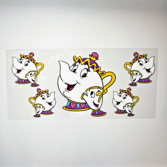 Creative Butterfly Mrs. Pots & Chip ceramic figurines, colorful decorative kitchen accessories on a white background.