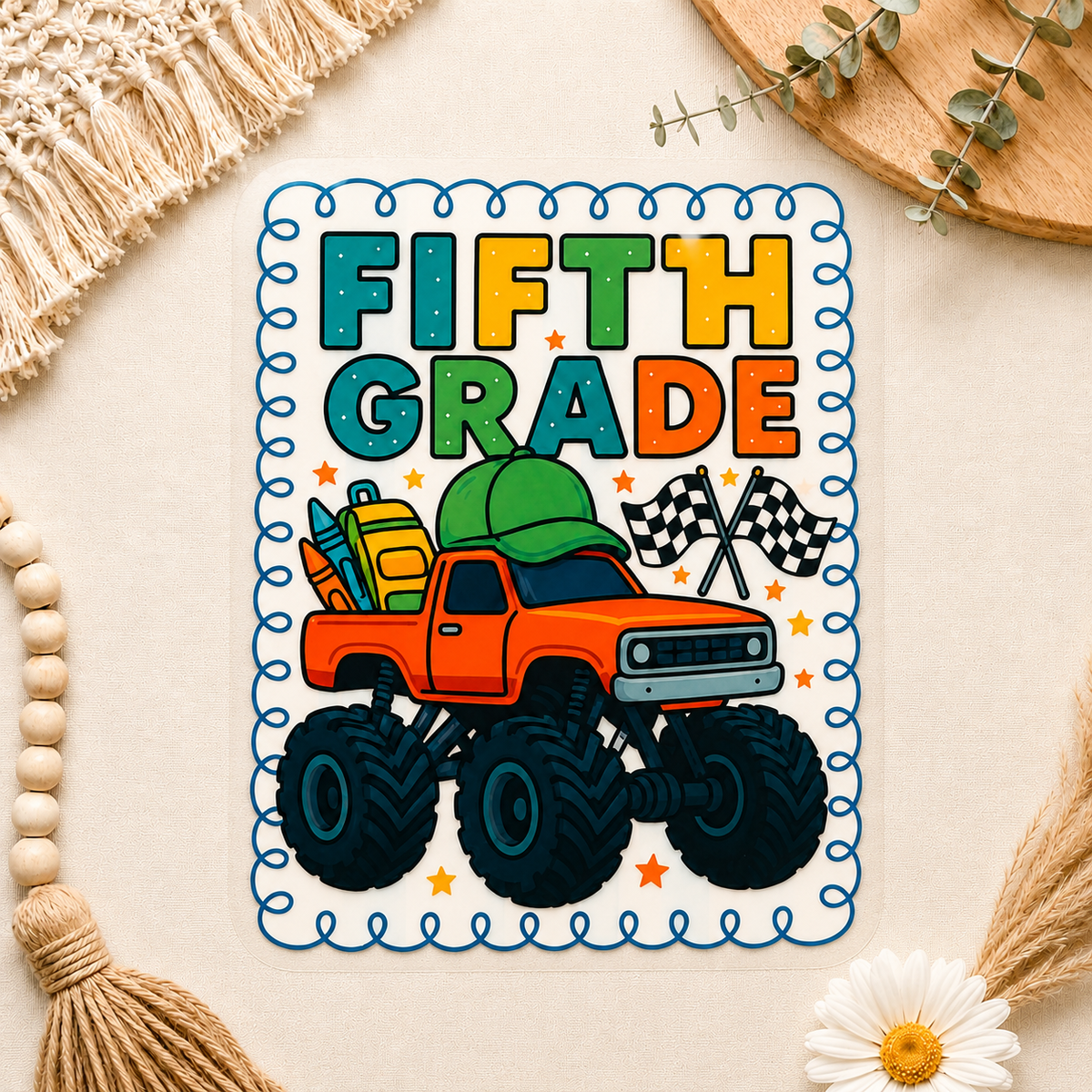 Creative Butterfly monster truck grade level kids DTF transfer sheet with colorful truck design on a white background.