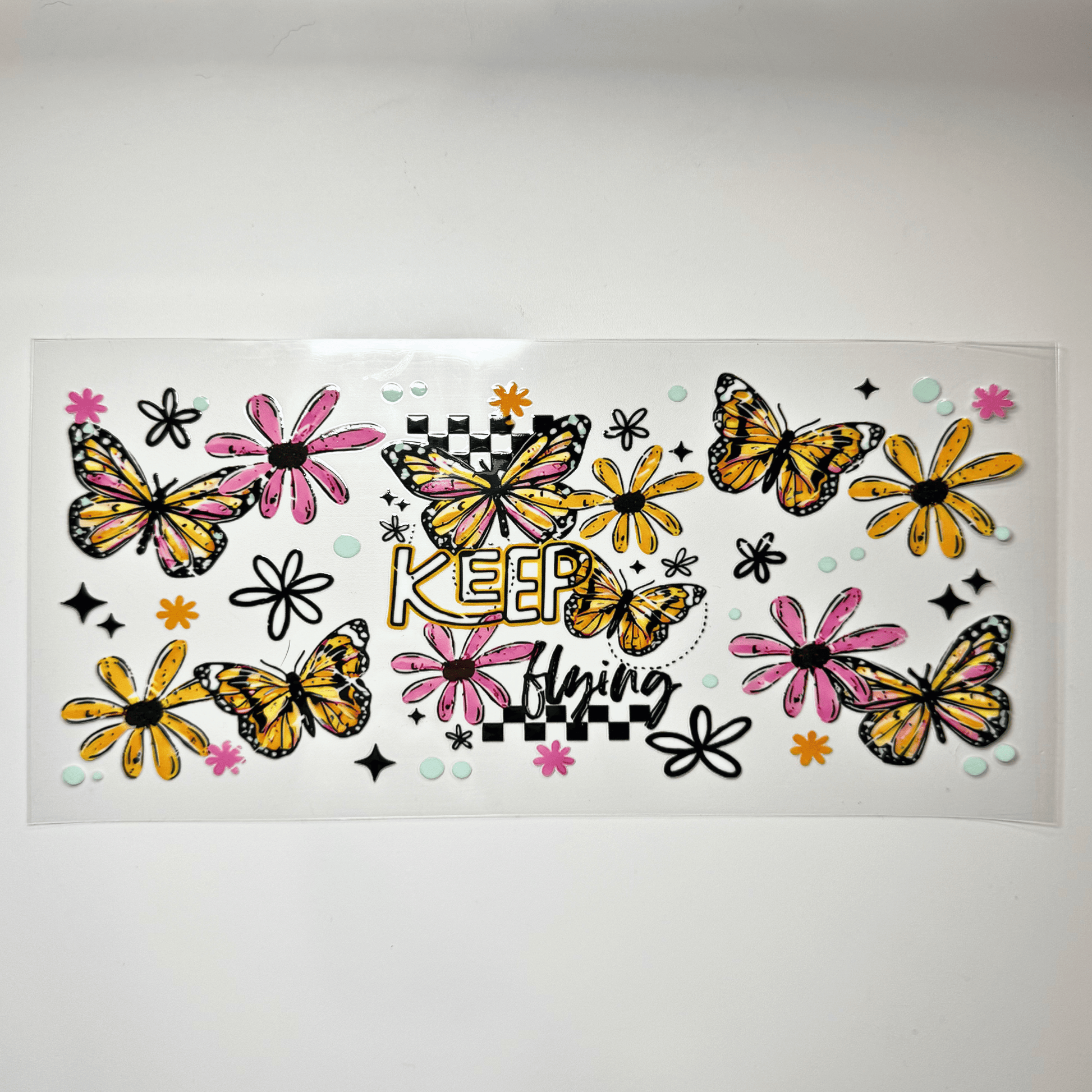 Creative Butterfly Keep Flying motivational wall art featuring a colorful butterfly design on a white background.