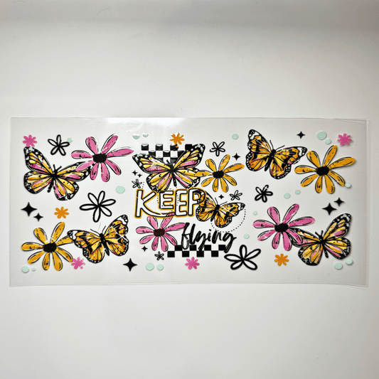 Creative Butterfly Keep Flying motivational wall art featuring a colorful butterfly design on a white background.