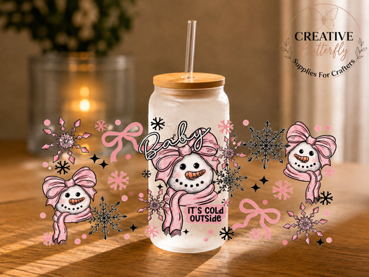 Creative Butterfly 020W glass jar with snowman design, pink bow, and straw, featuring snowflakes and "Baby It's Cold Outside" text.